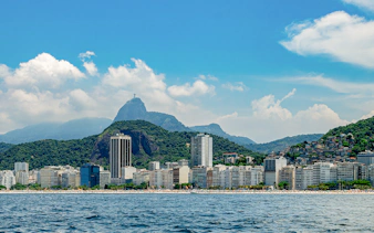 View of Rio de Janeiro skyline with Christ the Redeemer from a speedboat tour.