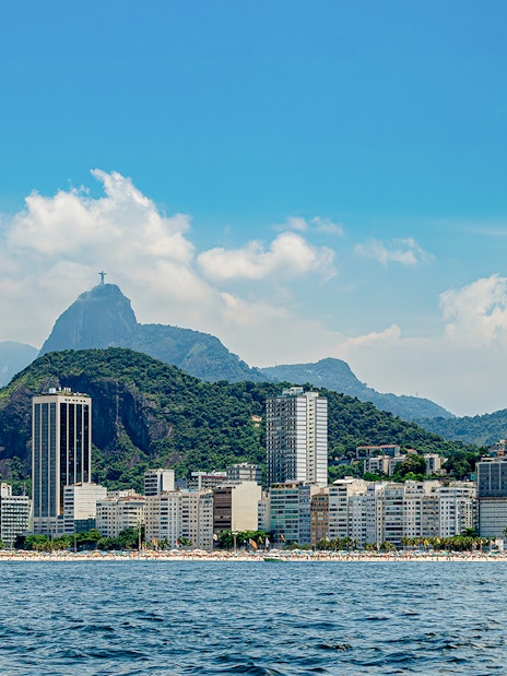 View of Rio de Janeiro skyline with Christ the Redeemer from a speedboat tour.