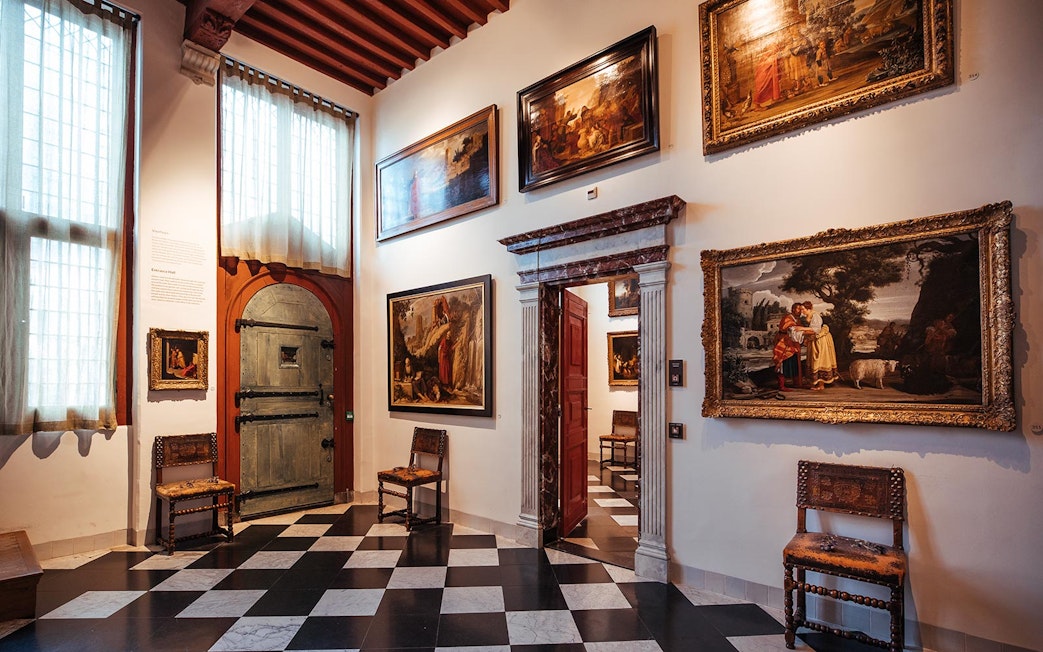 Paintings displayed in a room at the Rembrandt House Museum, Amsterdam.