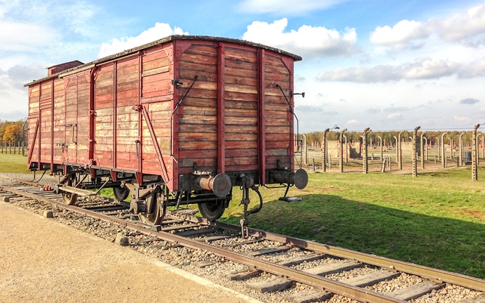 Railway wagon on tracks at Auschwitz II-Birkenau, Poland.