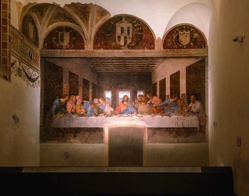 The Last Supper mural by Leonardo da Vinci in Milan, Italy, depicting Jesus and apostles.