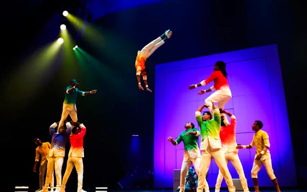 Acrobats performing a human pyramid at Cirque Du Soleil ECHO.