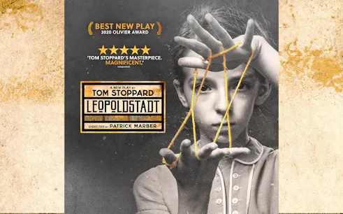 Leopoldstadt play poster featuring a child with string art, highlighting award recognition.