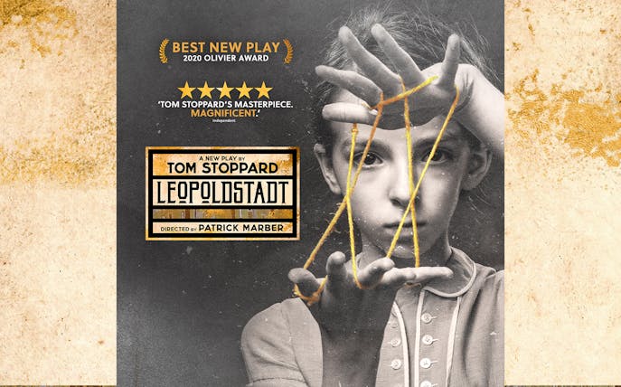 Leopoldstadt play poster featuring a child with string art, highlighting award recognition.