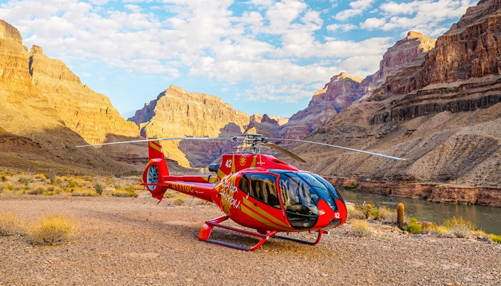 Helicopter tour landing in the Grand Canyon, Arizona, with scenic canyon views.