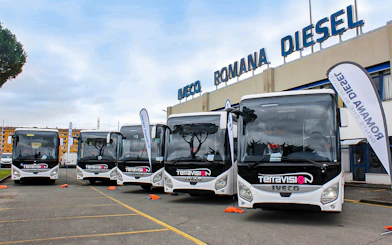 Fleet of Terravision buses at Fiumicino Airport transfer station.