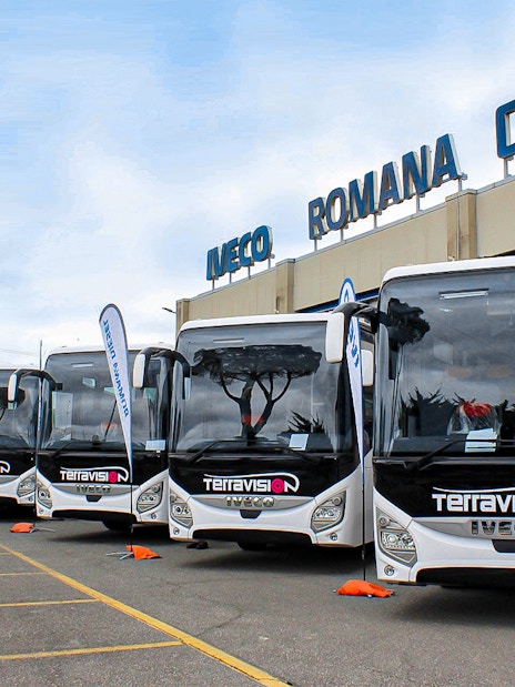 Fleet of Terravision buses at Fiumicino Airport transfer station.