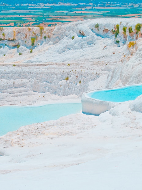 Pamukkale thermal terraces with turquoise pools in Turkey.