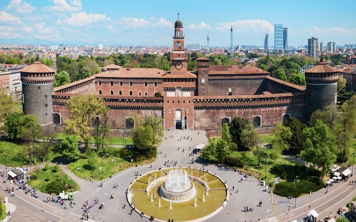 Aerial view of Sforza Castle in Milan with surrounding park and fountain.