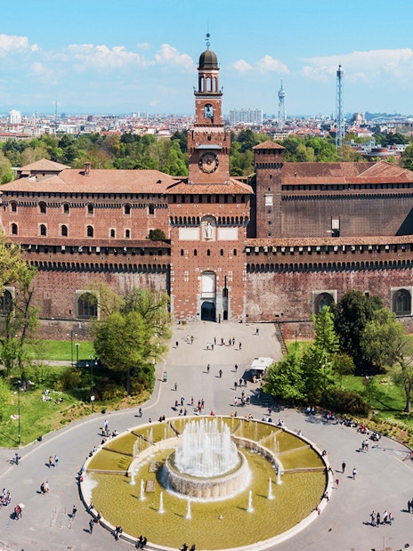 Aerial view of Sforza Castle in Milan with surrounding park and fountain.