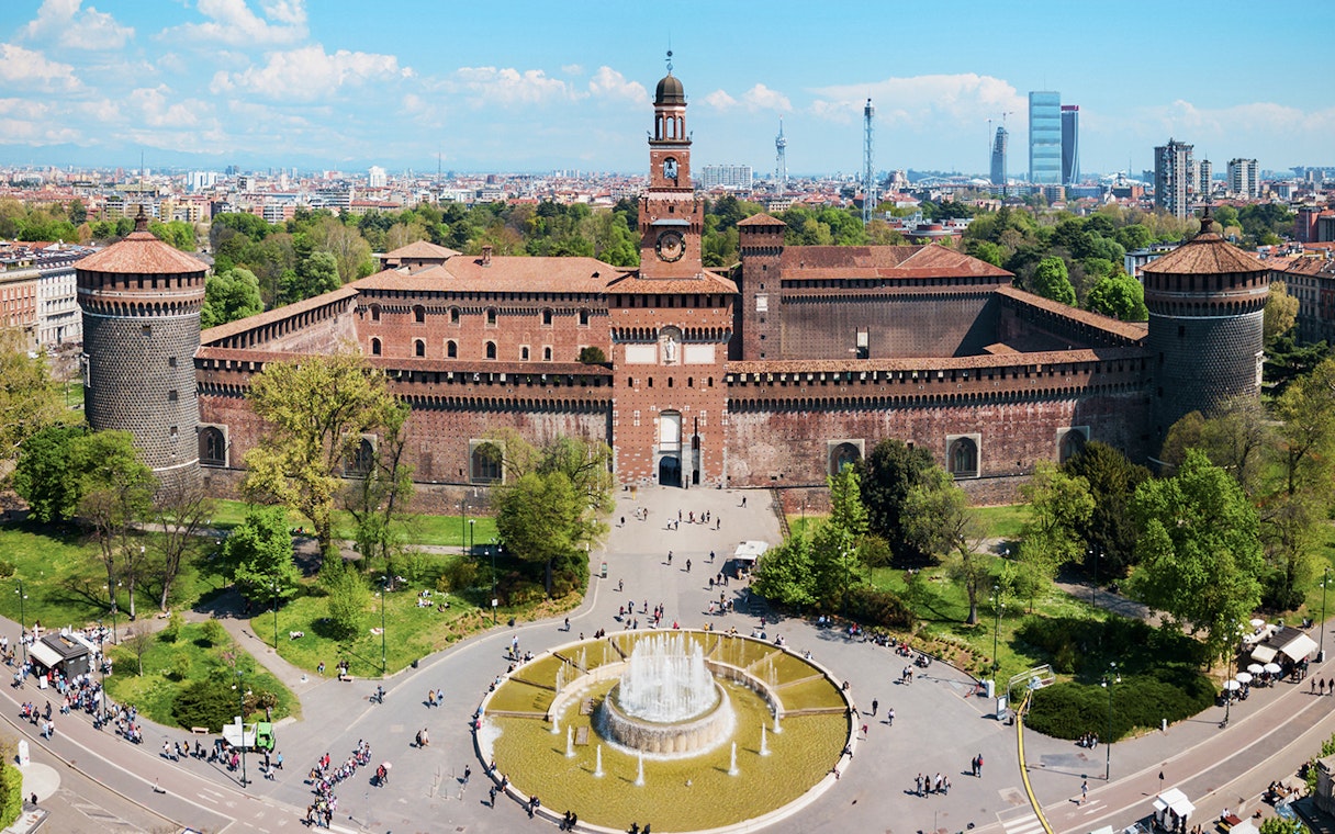 Aerial view of Sforza Castle in Milan with surrounding park and fountain.