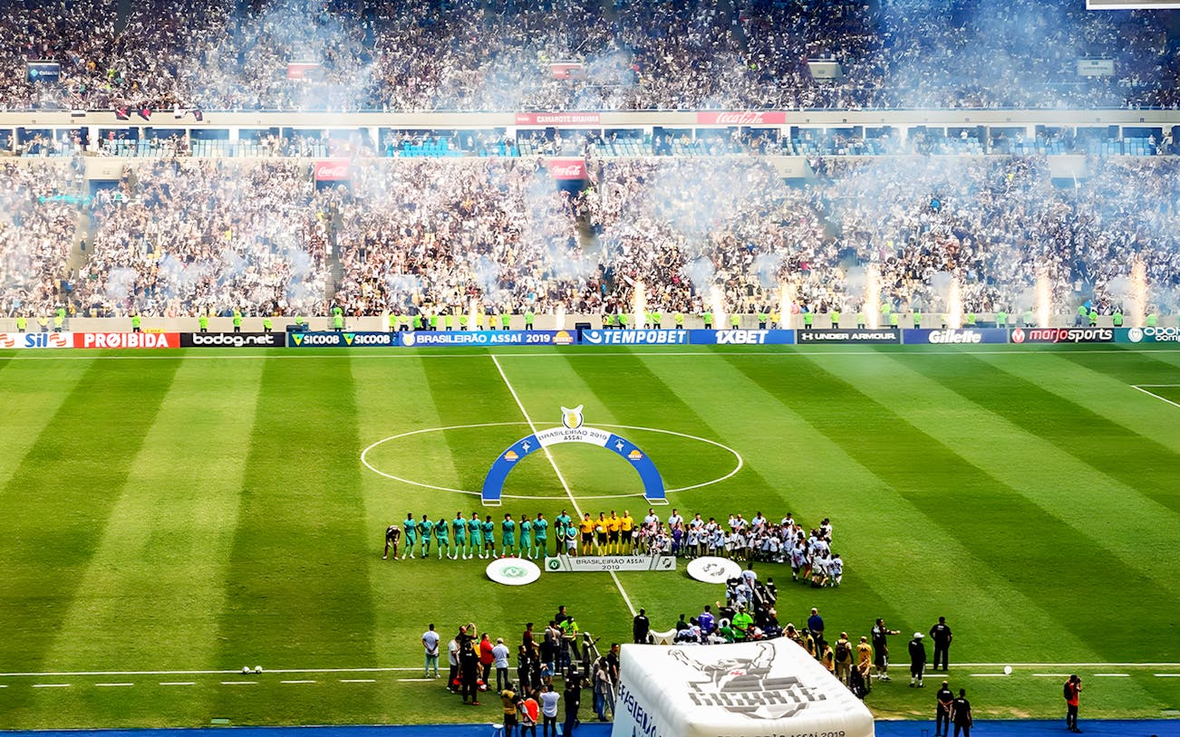 Spectators watching a football match at Maracanã Stadium, Brazil.