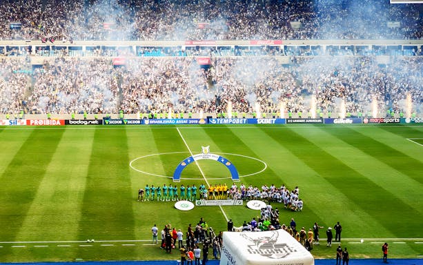 Spectators watching a football match at Maracanã Stadium, Brazil.