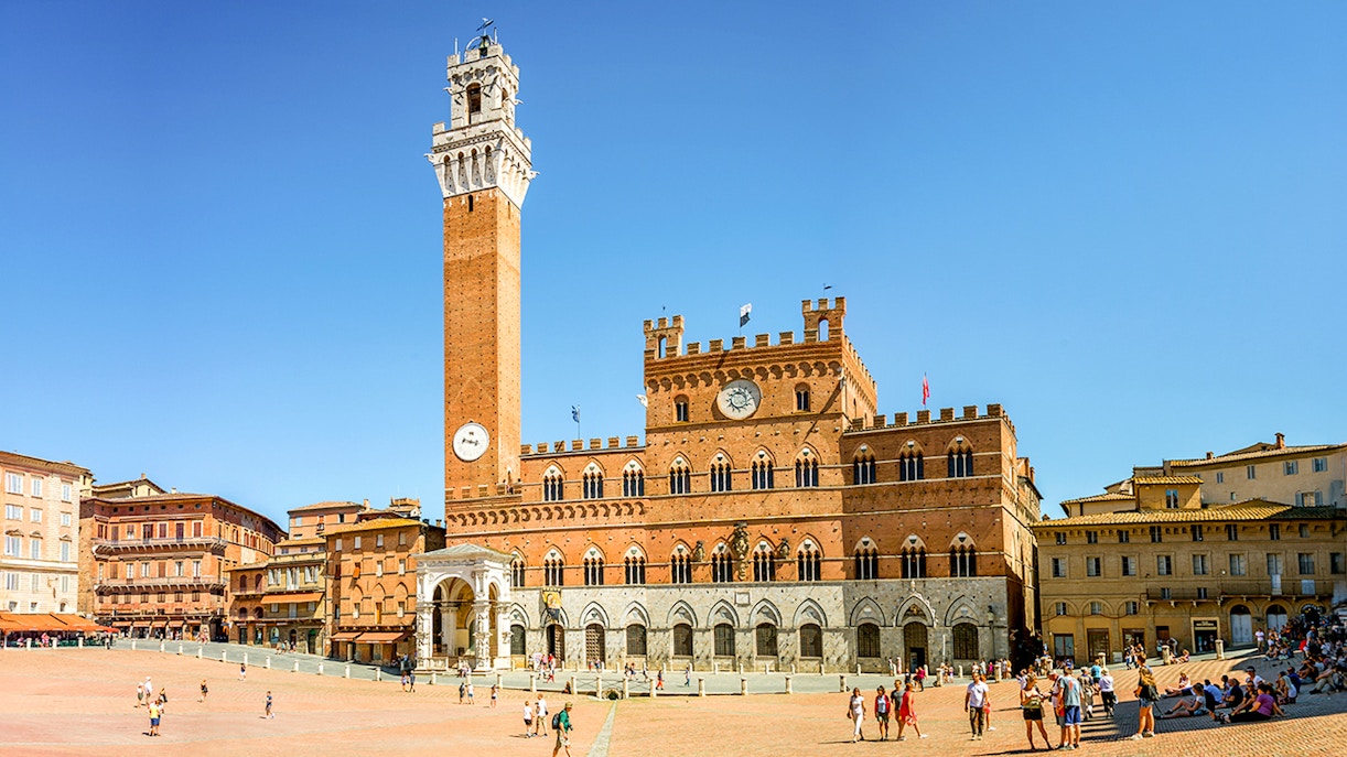 Piazza del Campo in Siena with Torre del Mangia and Palazzo Pubblico.