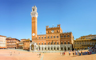 Piazza del Campo in Siena with Torre del Mangia and Palazzo Pubblico.
