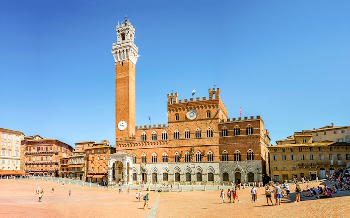 Piazza del Campo in Siena with Torre del Mangia and Palazzo Pubblico.