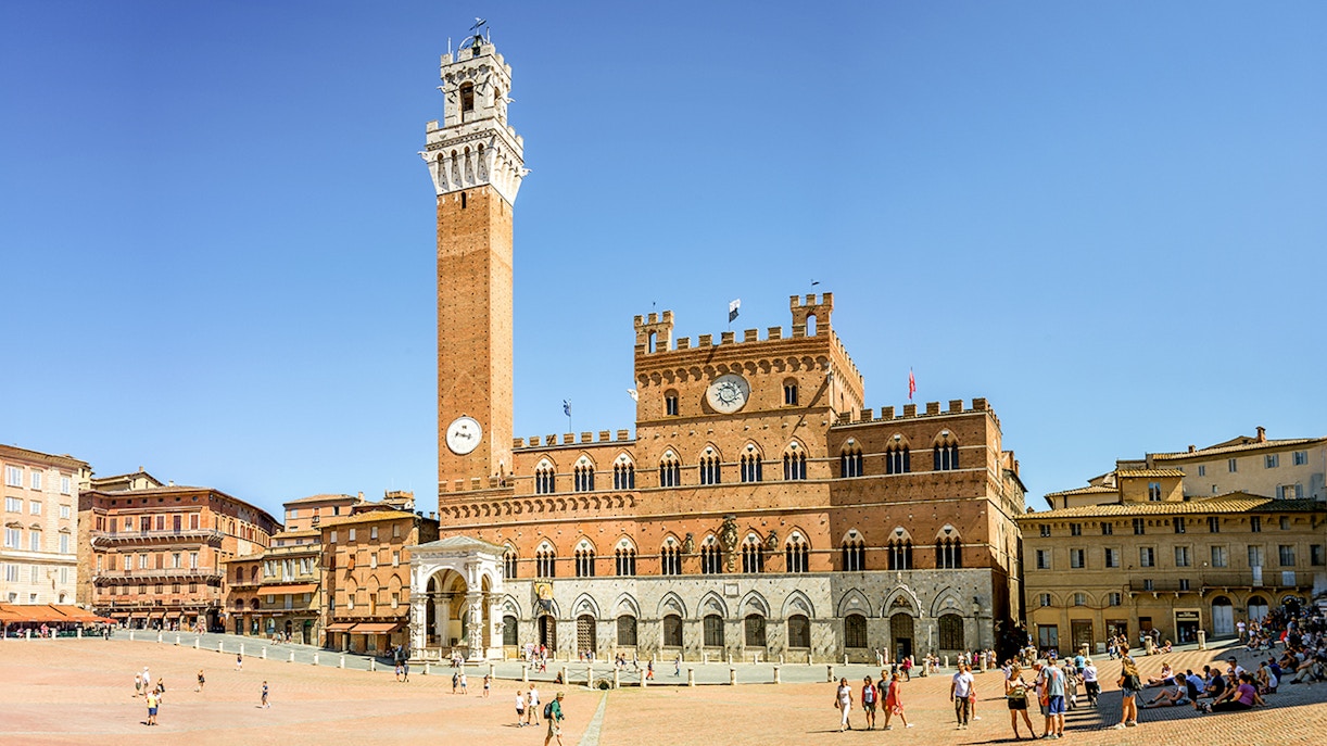 Piazza del Campo in Siena with Torre del Mangia and Palazzo Pubblico.