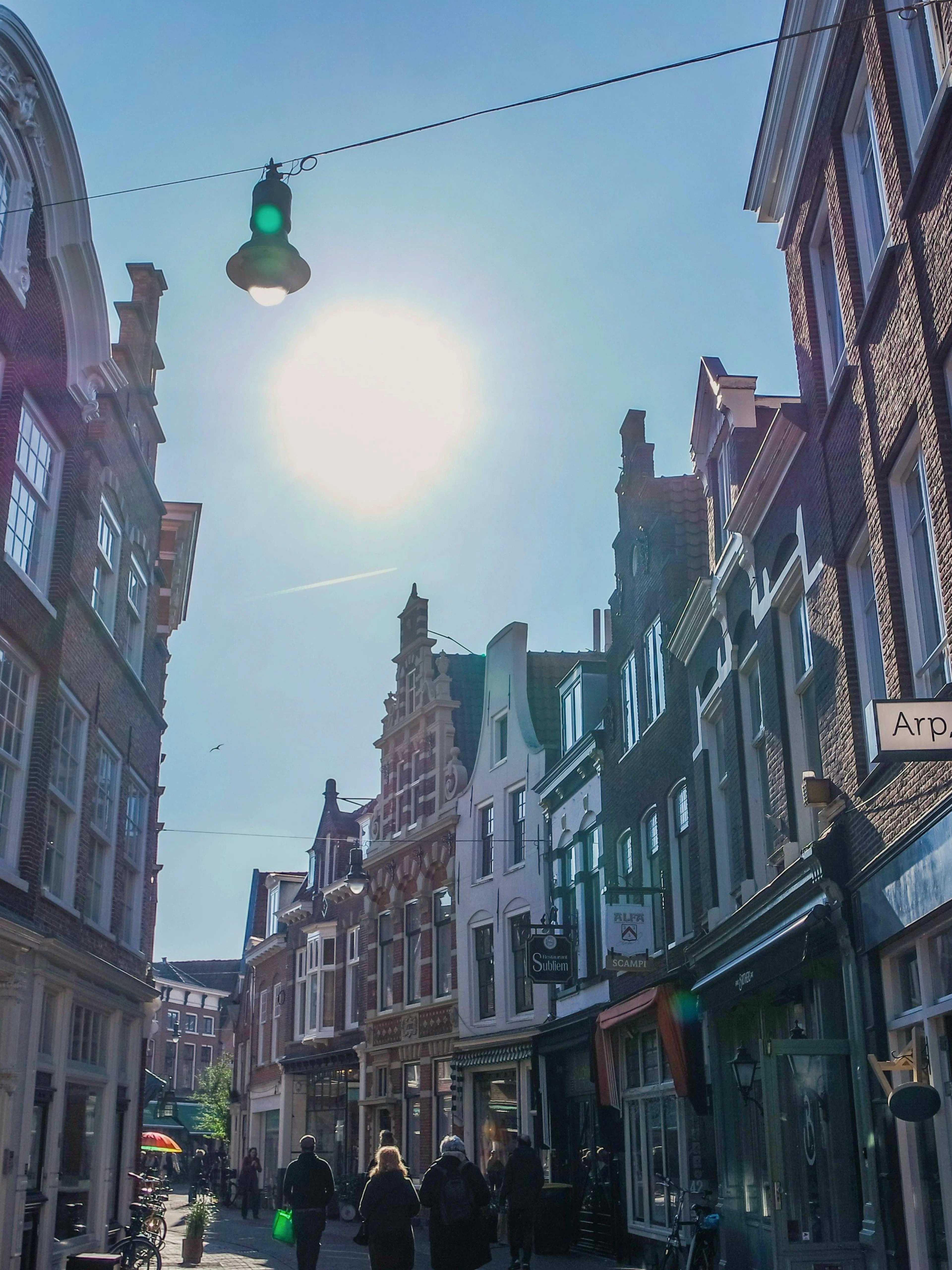 Historic street view in Haarlem with traditional Dutch architecture.