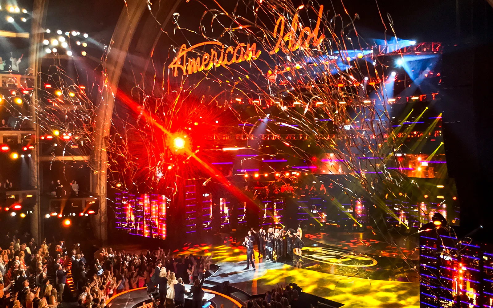 American Idol stage with performers and audience at The Dolby Theatre.