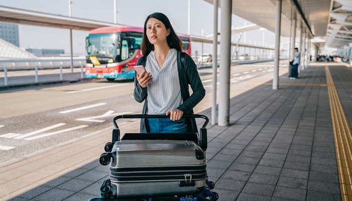 tourist waiting for bus