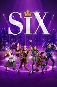 Performers on stage in the musical "Six" at West End, vibrant costumes and dynamic poses.