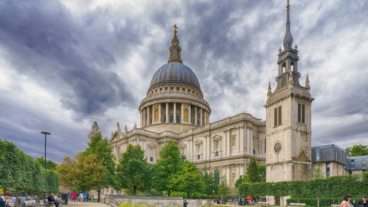 St Paul's Cathedral in London with its iconic dome and surrounding gardens.