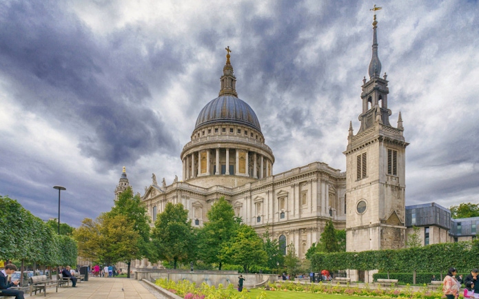 St Paul's Cathedral in London with its iconic dome and surrounding gardens.