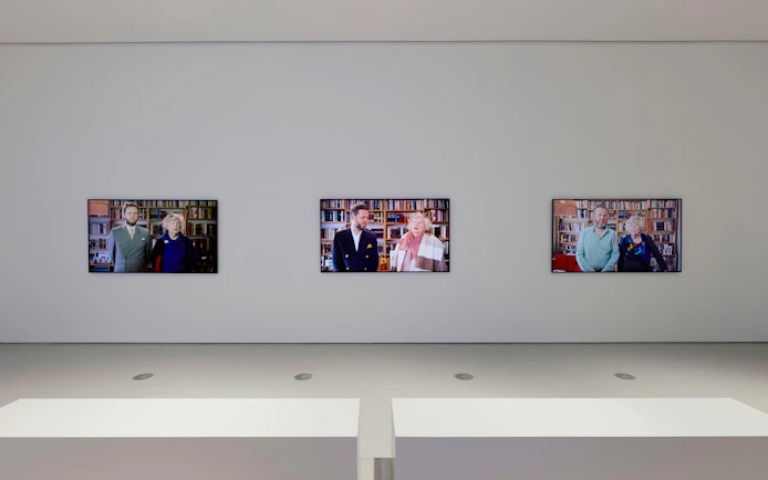 Three video screens displaying portraits at Ragnar Kjartansson: Mercy Exhibition, National Gallery of Victoria.