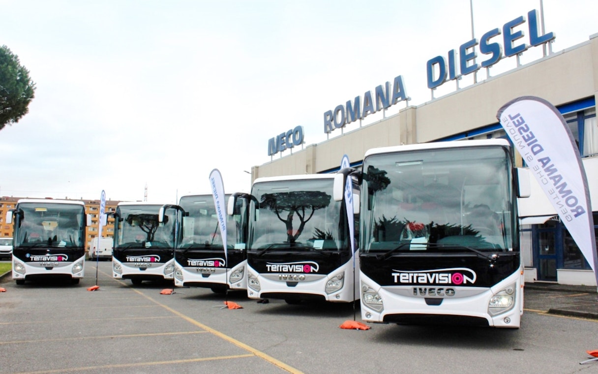 Terravision buses parked outside Iveco Romana Diesel building.