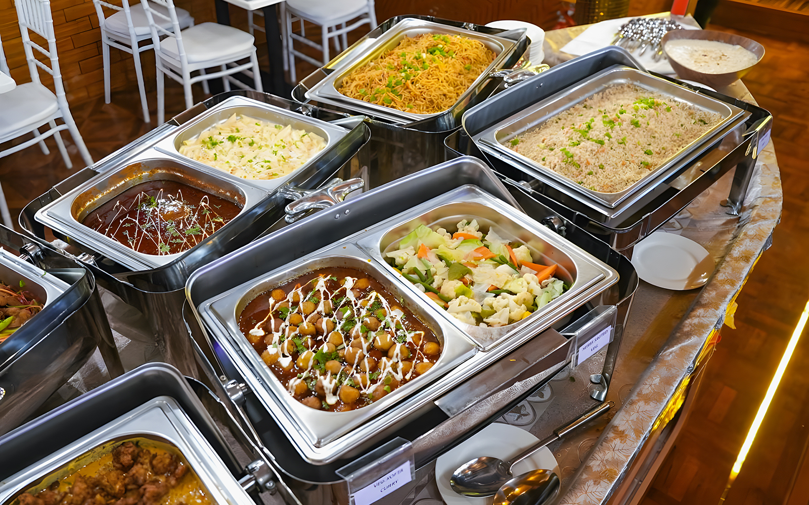 Buffet dinner spread on a Dubai Marina dhow cruise with various dishes.