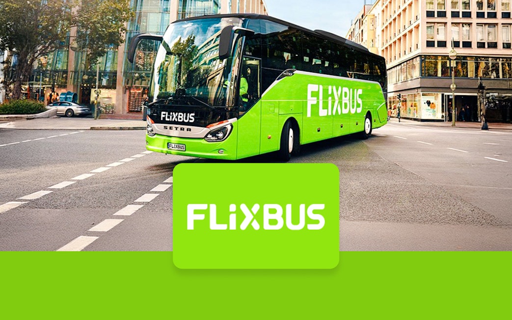 FlixBus in city street, Amsterdam to Efteling route.