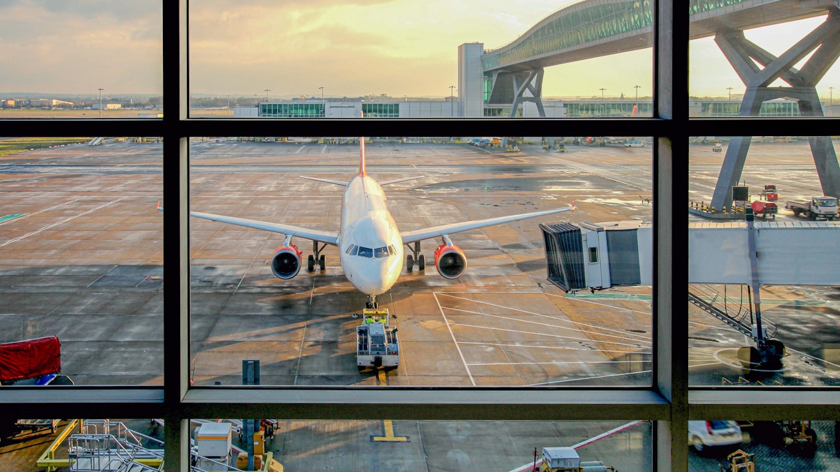 Airplane at gate with jet bridge at Gatwick Airport.