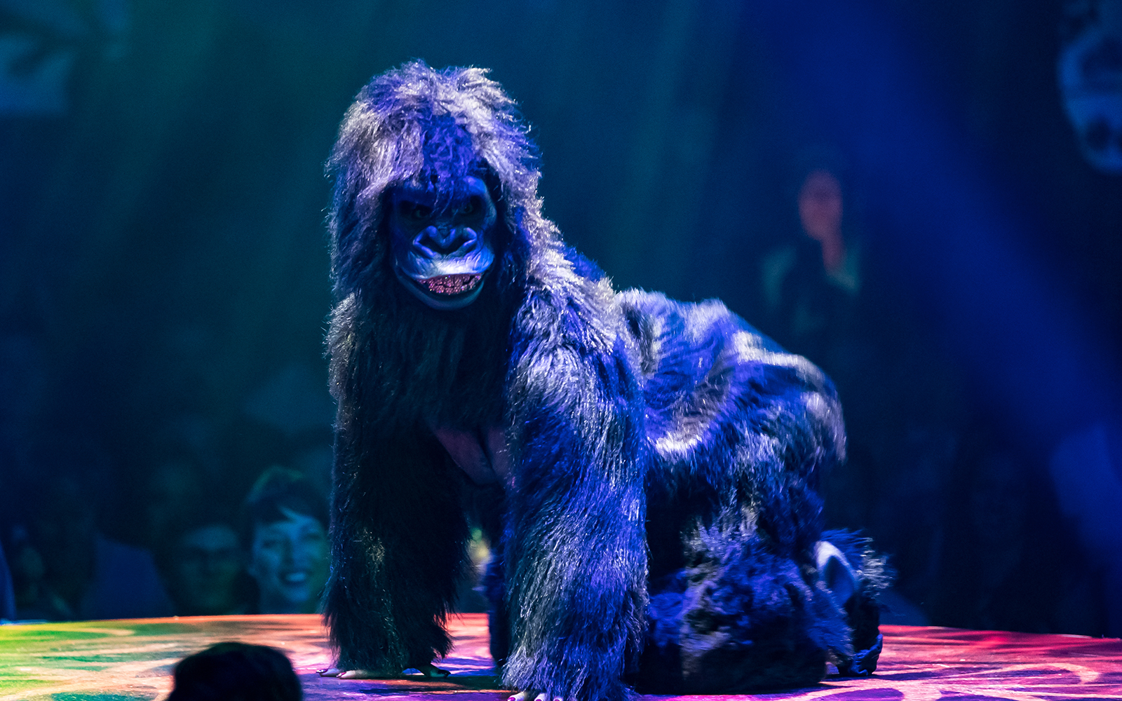 Gorilla costume performer on stage during Absinthe show.