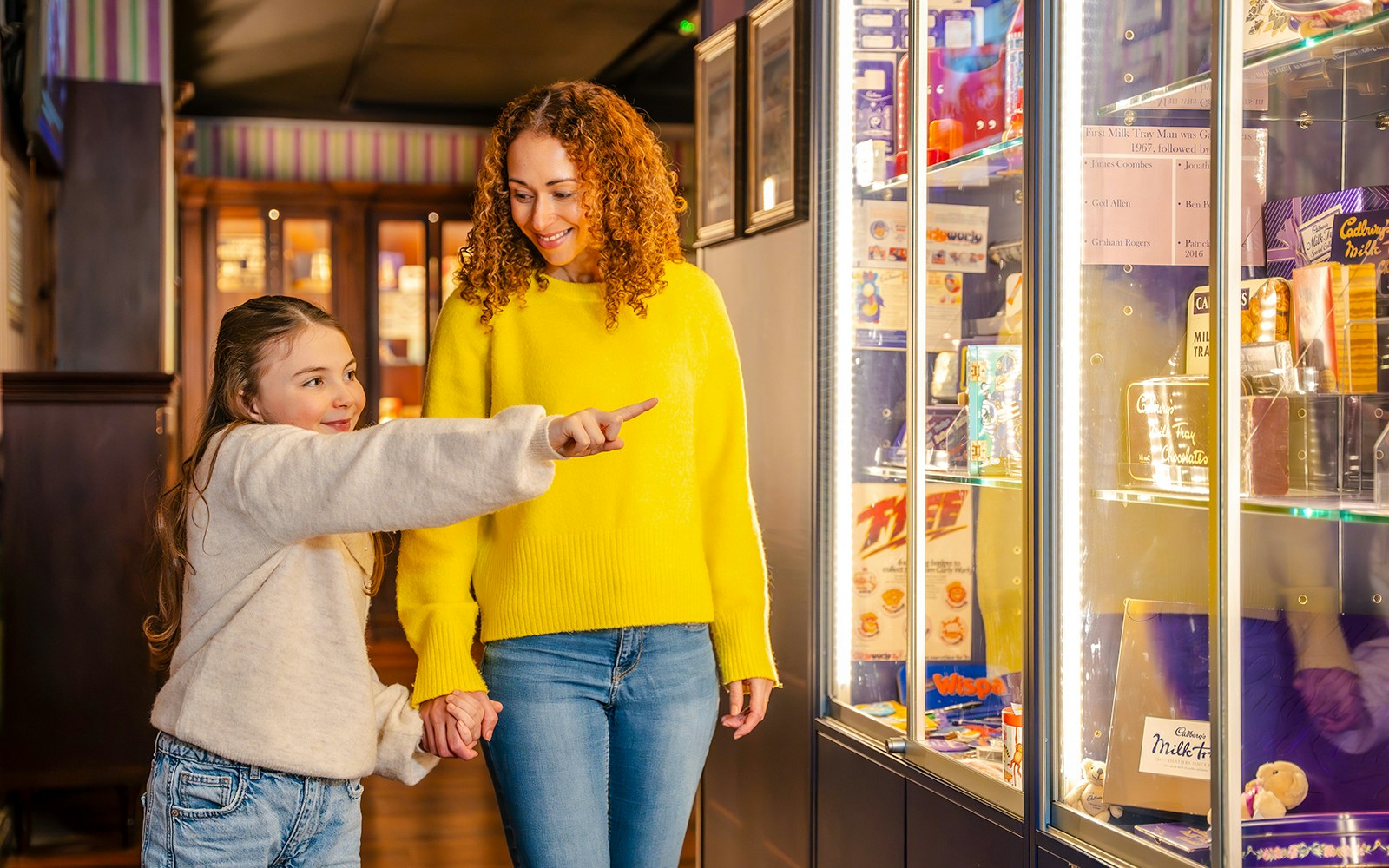 Guests exploring exhibits at the Bourneville Experience, Cadbury World.
