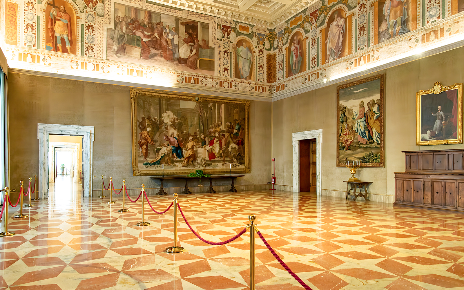 Interior of St. John Lateran with frescoes and ornate ceiling, Rome.