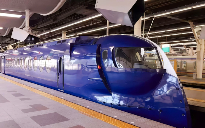 Nankai Limited Express train at platform, Kansai Airport to Namba Station transfer.