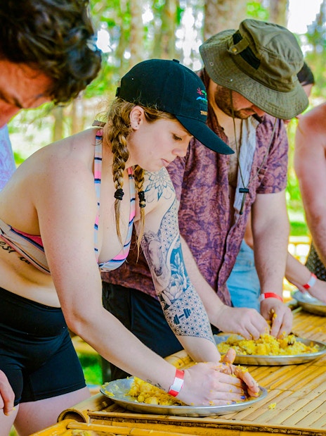 People preparing food at Lily Elephant Camp, Phuket.