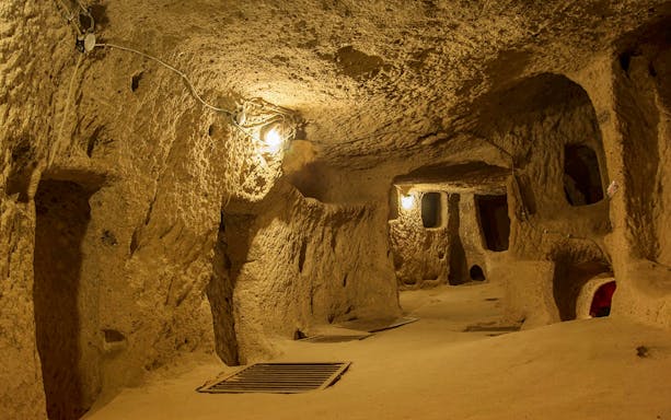 Derinkuyu underground cave city interior with stone walls and passageways.
