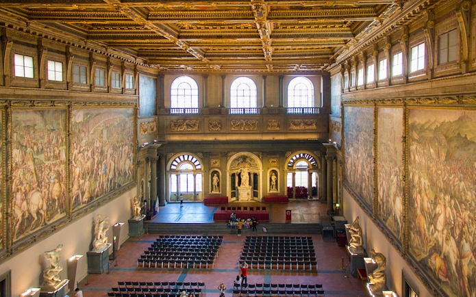 Palazzo Vecchio Hall of the Five Hundred with frescoes and statues, Florence, Italy.