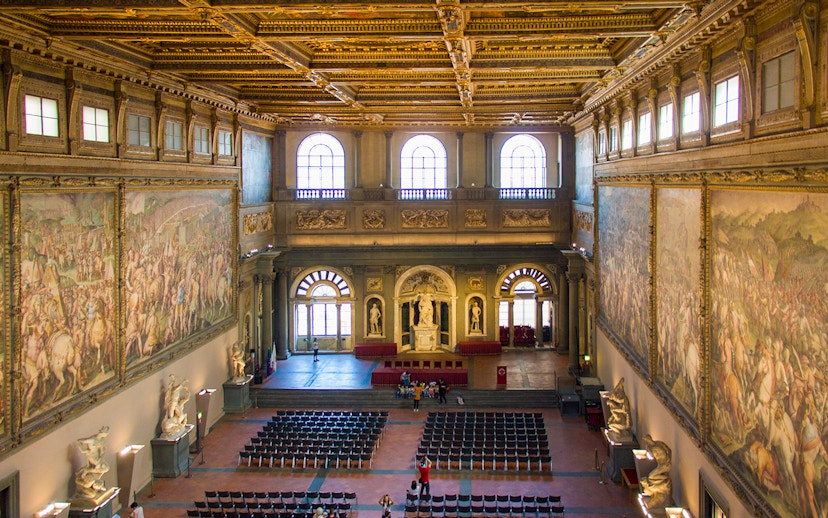 Palazzo Vecchio Hall of the Five Hundred with frescoes and statues, Florence, Italy.