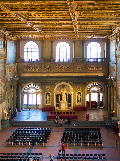 Palazzo Vecchio Hall of the Five Hundred with frescoes and statues, Florence, Italy.