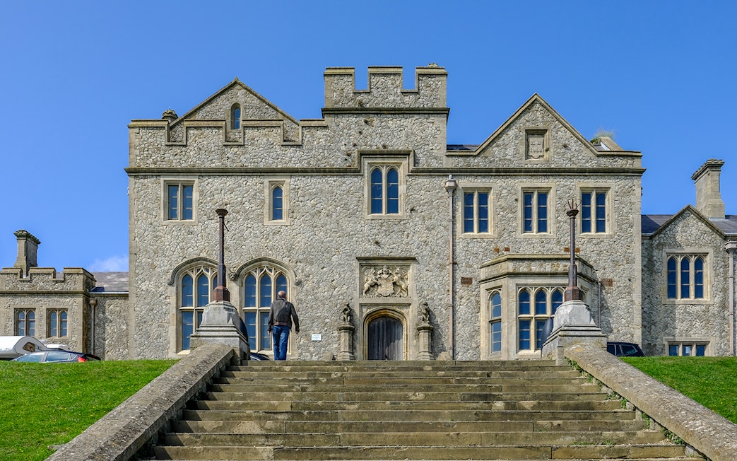 Officers New Barracks with stone steps leading to historic building entrance.