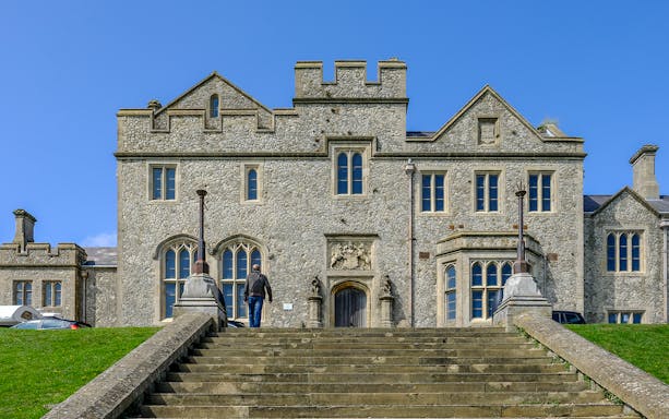 Officers New Barracks with stone steps leading to historic building entrance.