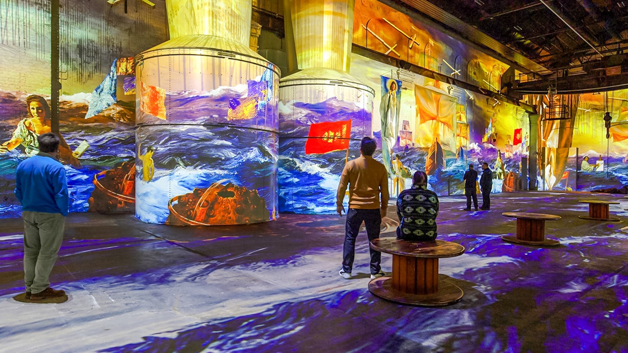 Immersive art projections at Phoenix des Lumières exhibit.