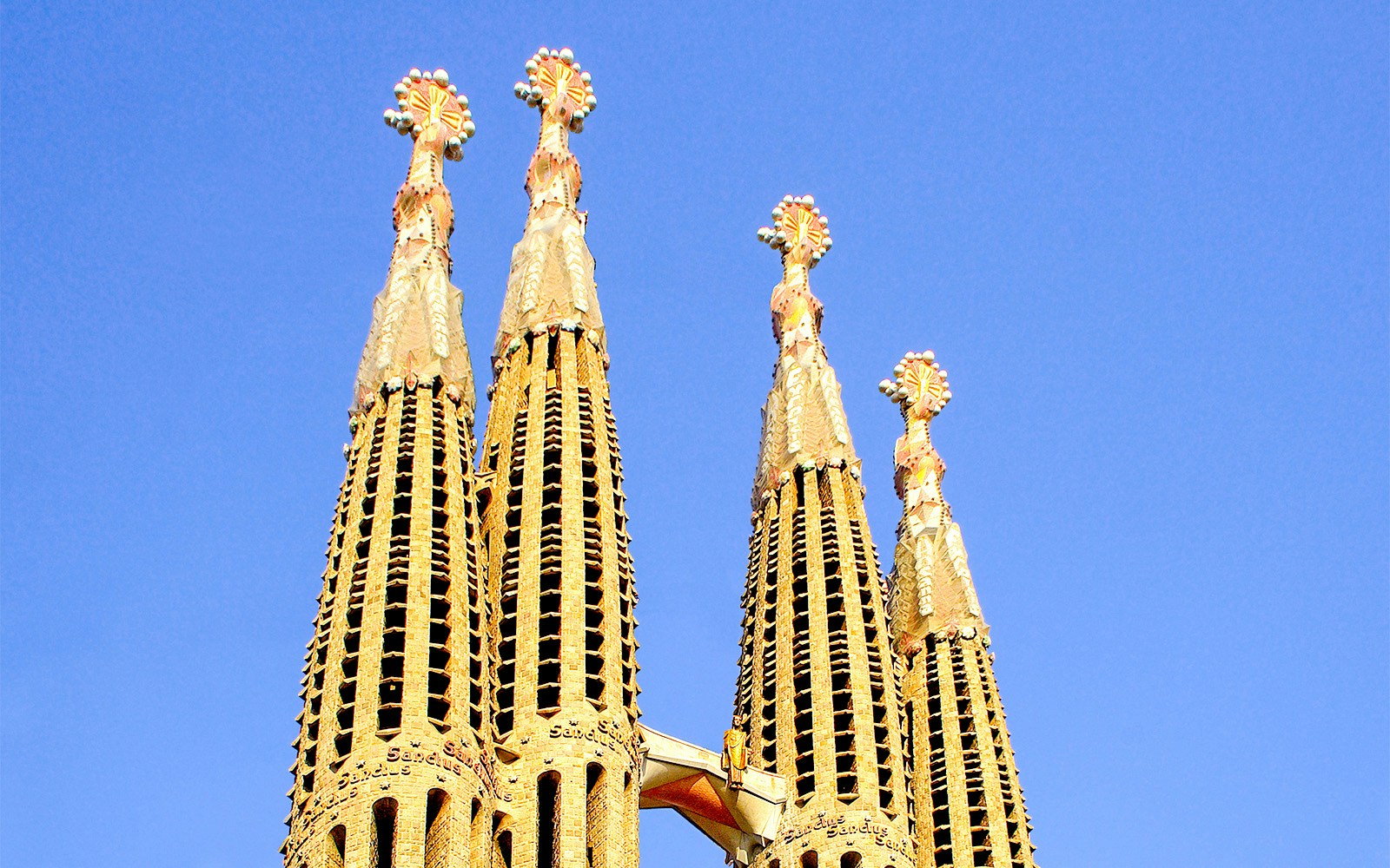 Sagrada Familia Passion Facade sculptures in Barcelona, Spain, showcasing intricate biblical scenes.