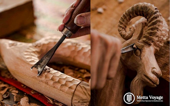 Wood carving in progress at Driftwood Village Hoi An workshop, featuring intricate animal designs.