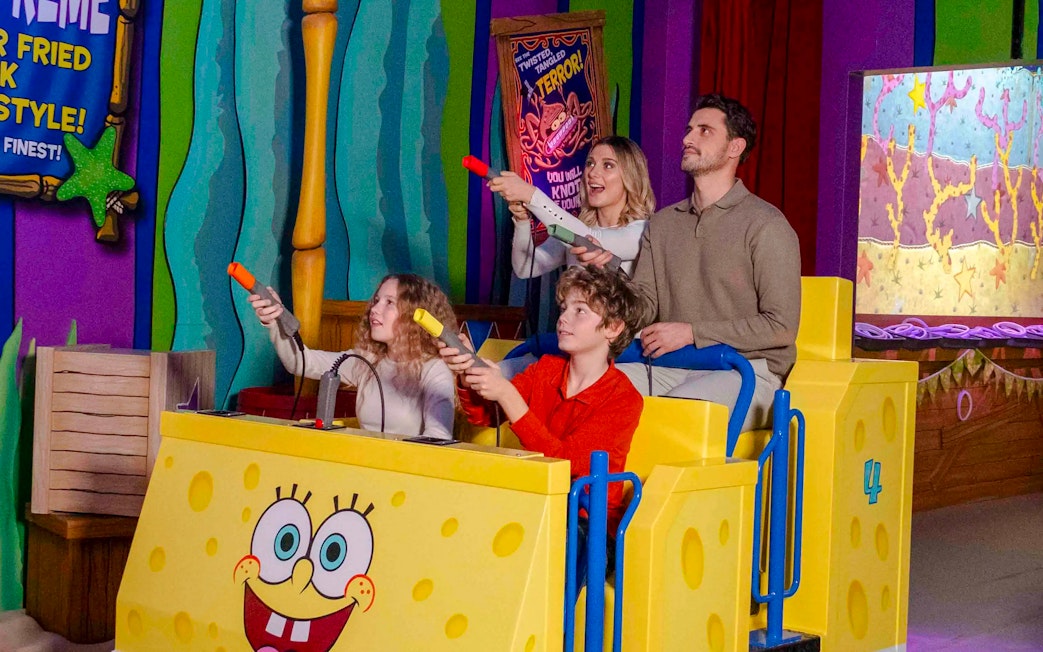 Guests enjoying a SpongeBob-themed ride at Nickelodeon Play City in Istanbul.