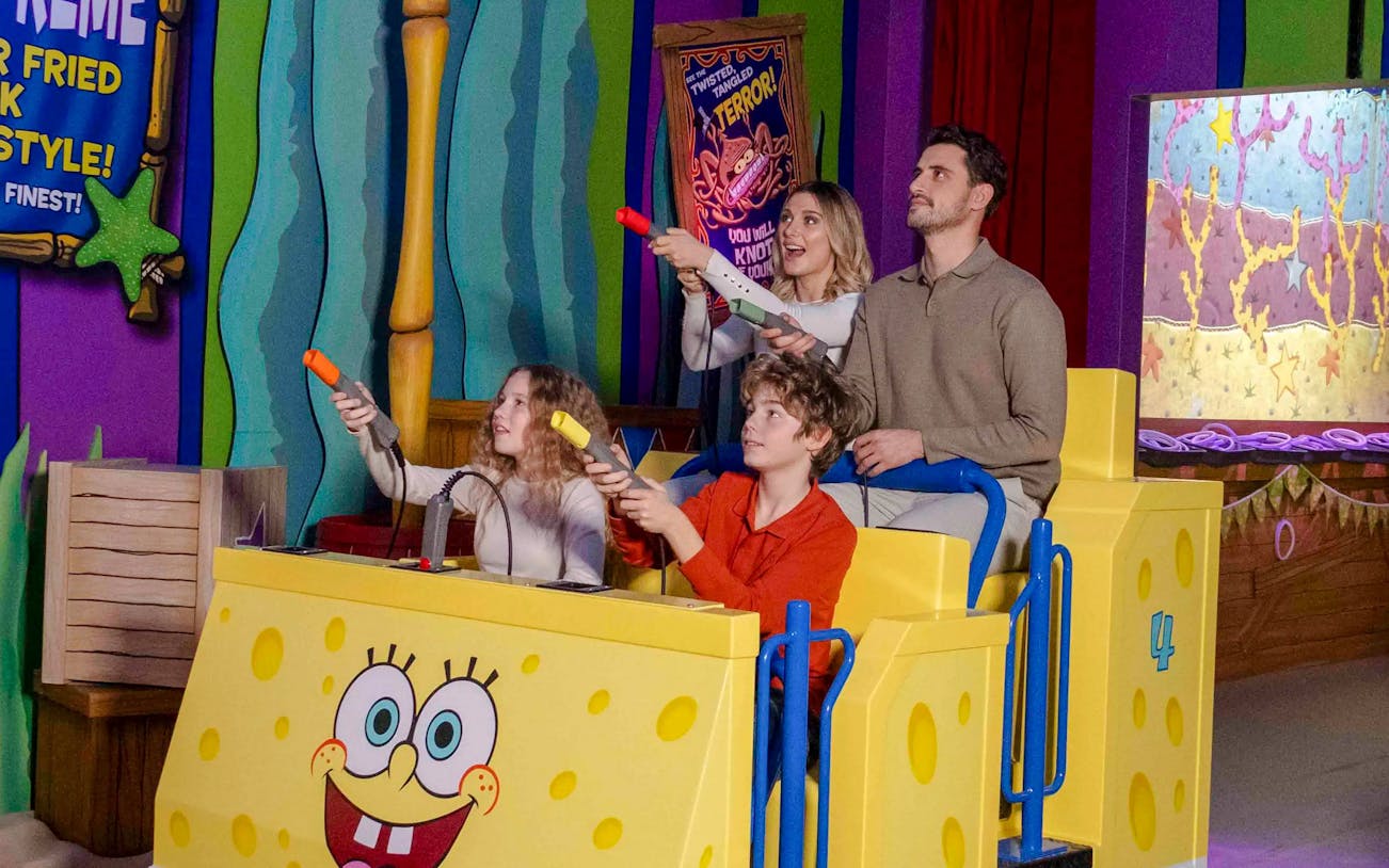 Guests enjoying a SpongeBob-themed ride at Nickelodeon Play City in Istanbul.