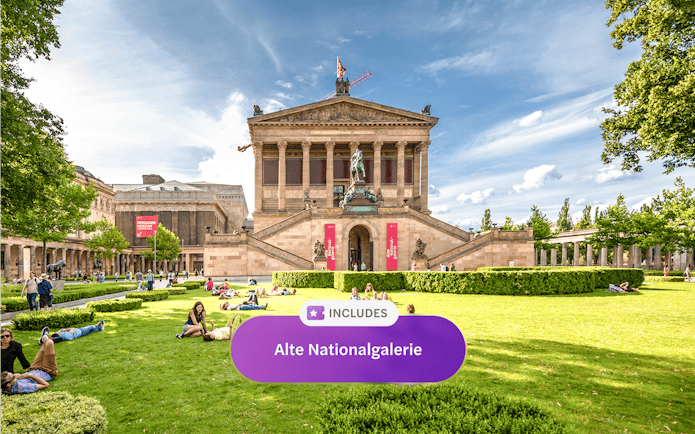 Alte Nationalgalerie in Berlin with visitors relaxing on the lawn.