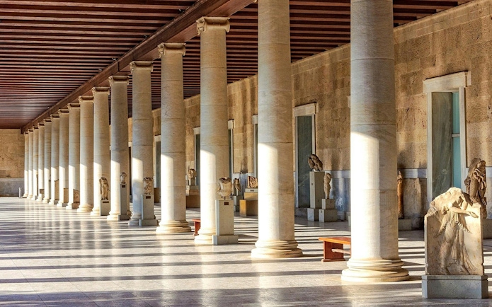 Stoa of Attalos columns and statues in Athens' Ancient Agora.